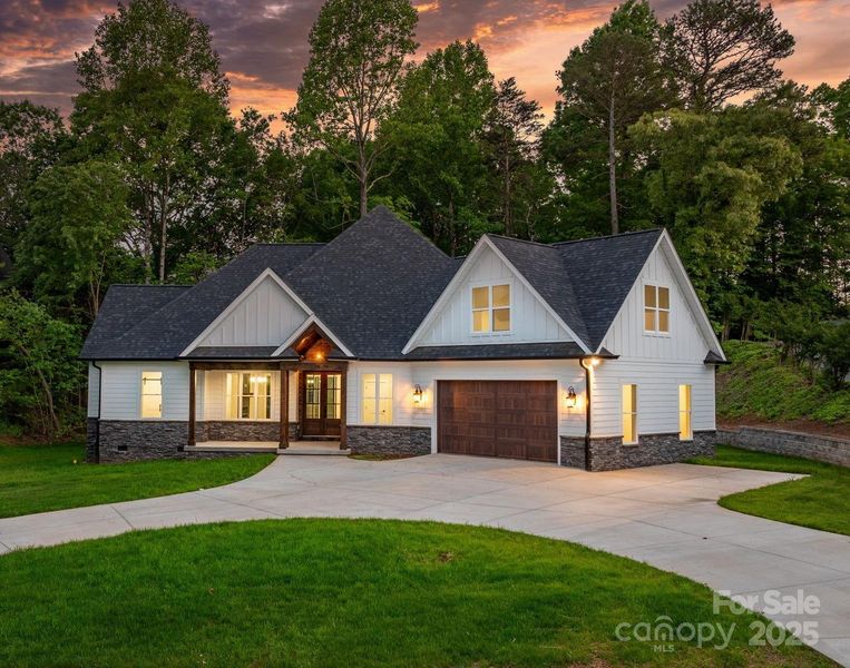 Front exterior of a new home in , Hickory, NC, highlighting curb appeal (Image 29).