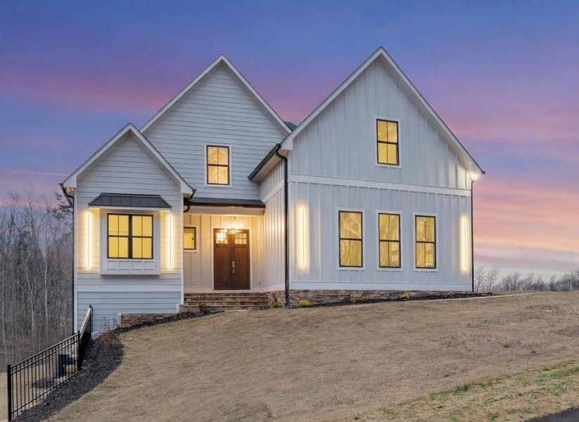 Front exterior of a new home in , Cumming, GA, highlighting curb appeal (Image 31).