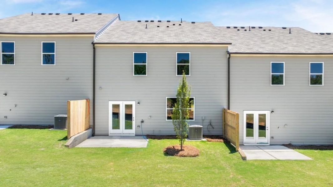 Exterior details and patio area of a home in Village at Pine Valley, Gainesville (Image 3).