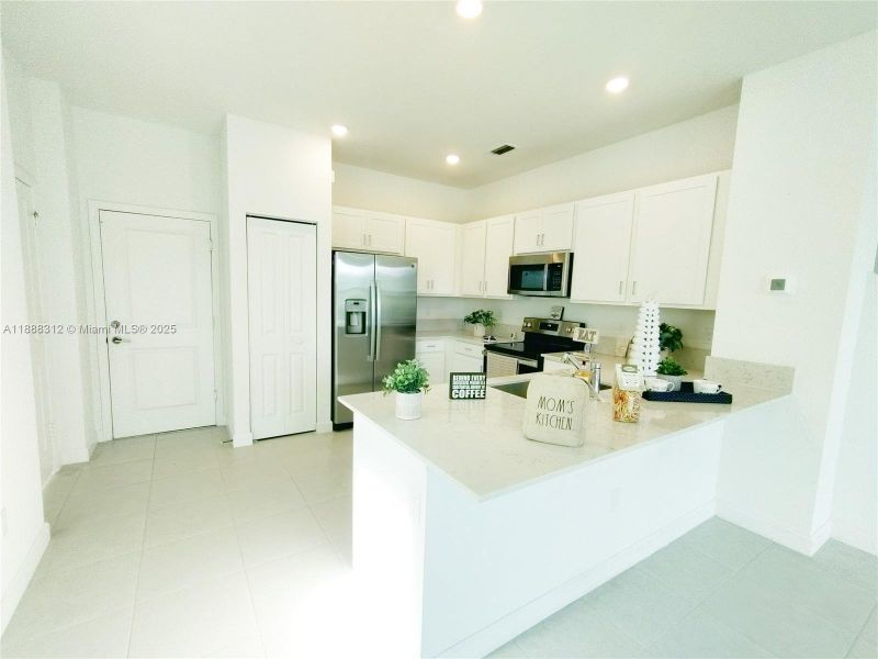 Furnished interior view inside a new home in , Lake Worth (Image 9). Furnished interior view inside a new home in , Lake Worth (Image 9).