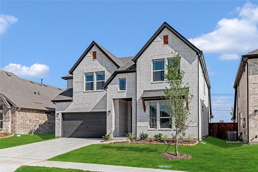 Front exterior of a new home in Creekview Meadows, Celina, TX, highlighting curb appeal (Image 26).