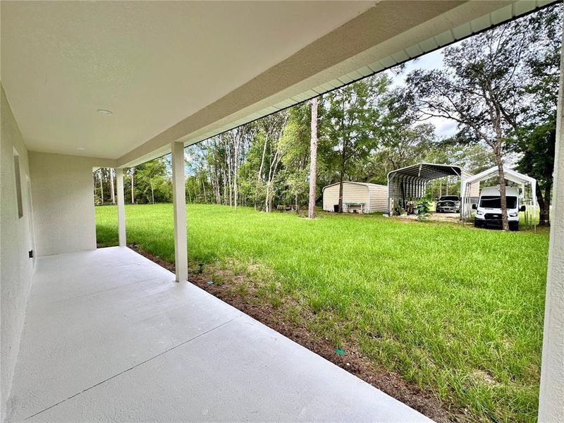 Exterior details and patio area of a home in , Citrus Springs (Image 20).
