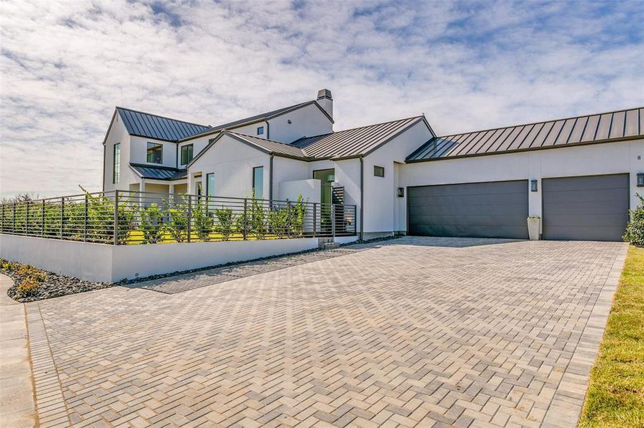 Exterior details and patio area of a home in Avadene at Las Colinas, Irving (Image 21).