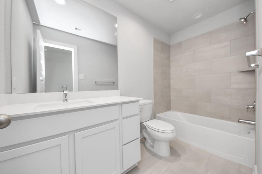 Furnished interior view inside a new home in Creekwood Crossing, Spring (Image 4). Furnished interior view inside a new home in Creekwood Crossing, Spring (Image 4).