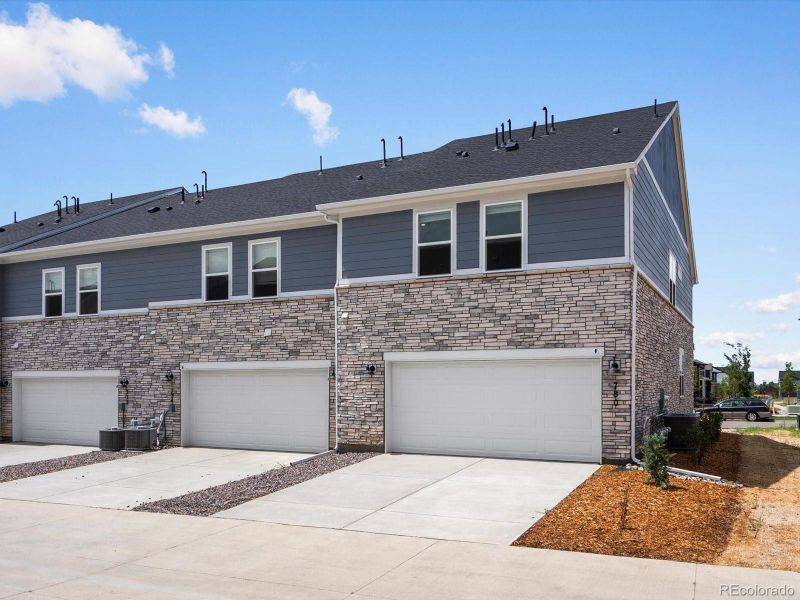 Front exterior of a new home in Horizon Uptown: The Meadow Collection, Aurora, CO, highlighting curb appeal (Image 2). Front exterior of a new home in Horizon Uptown: The Meadow Collection, Aurora, CO, highlighting curb appeal (Image 2).