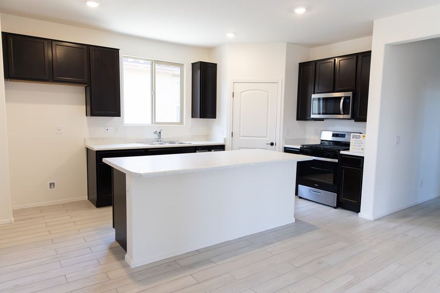 Furnished interior view inside a new home in The Legends at Gladden Farms, Marana (Image 3). Furnished interior view inside a new home in The Legends at Gladden Farms, Marana (Image 3).