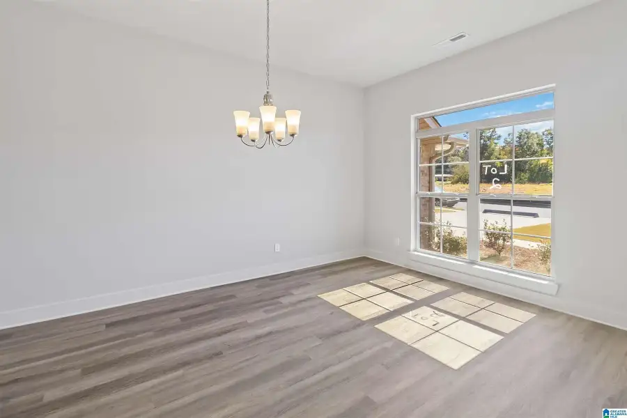 Representative unfurnished interior of a home built from the 3000 by Adams Homes in Flagler Estates, Hastings (Image 13).