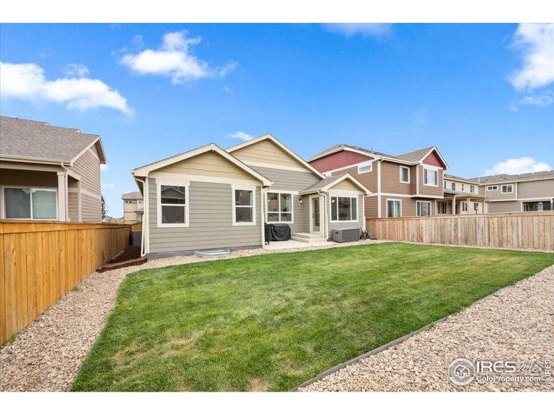 Front exterior of a new home in Hidden Valley, Severance, CO, highlighting curb appeal (Image 1).