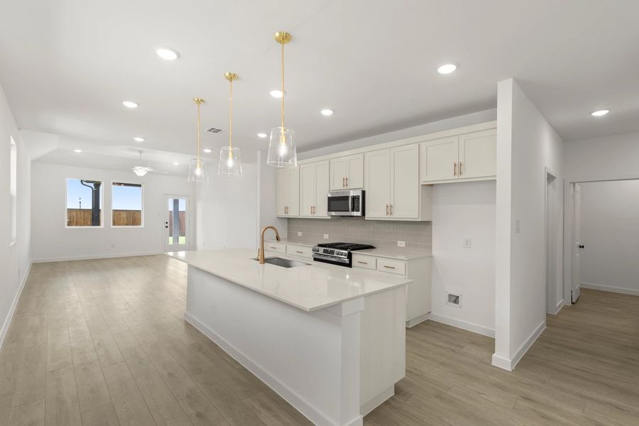 Open Kitchen-Living-Dining Room featuring the Serene Collection