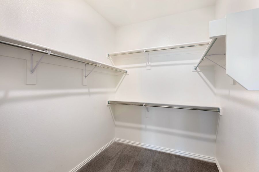 Representative unfurnished interior of a home built from the Hawthorne by UnionMain Homes in Edgewater, Fate (Image 19).