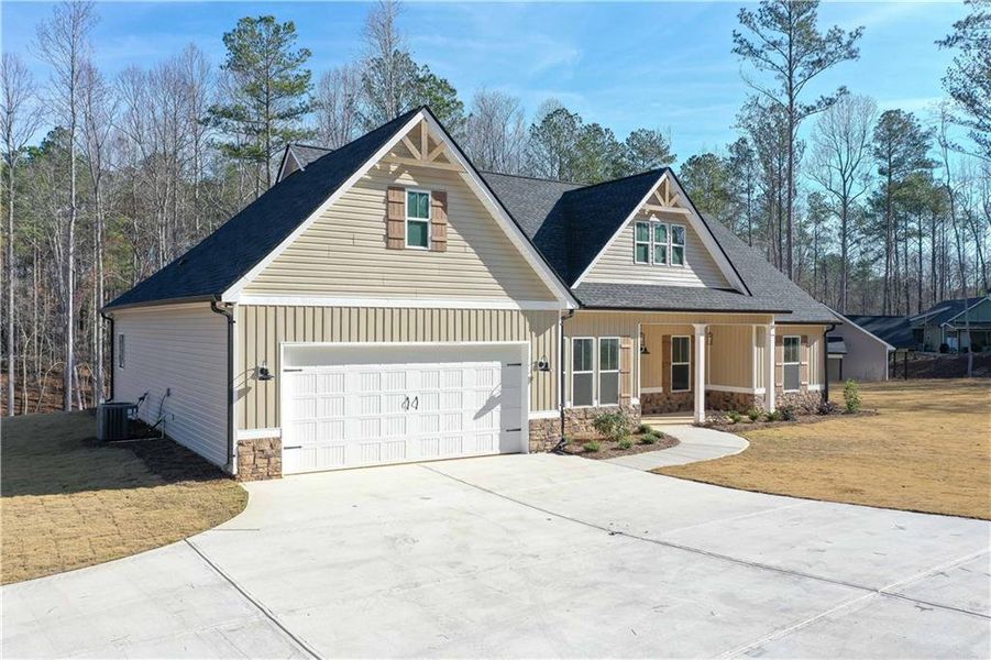Front exterior of a new home in , Buchanan, GA, highlighting curb appeal (Image 20).