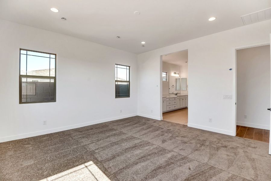 Spacious, unfurnished interior of a new home in Palo Verde at North Creek, Queen Creek (Image 22).