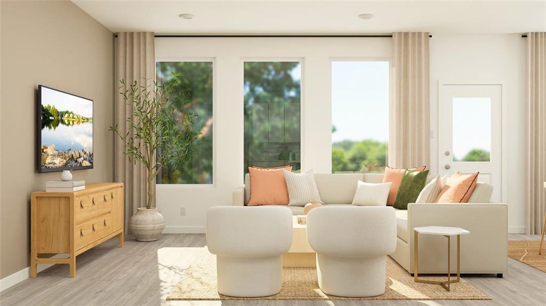 Living area with light hardwood / wood-style floors