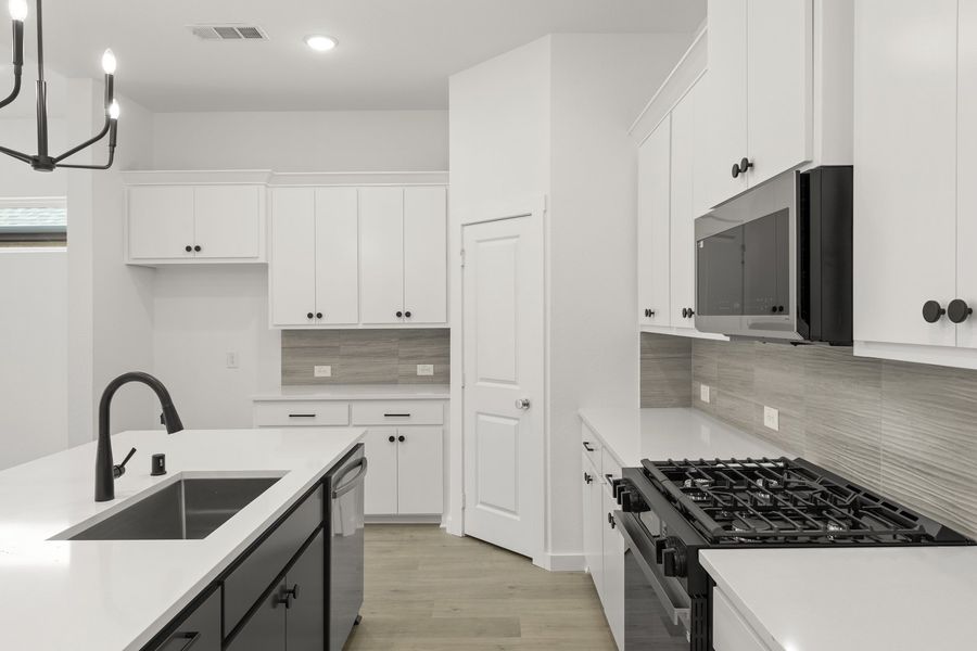 Furnished interior view inside a new home in Willow Grove Single-Family Homes, Melissa (Image 9). Furnished interior view inside a new home in Willow Grove Single-Family Homes, Melissa (Image 9).