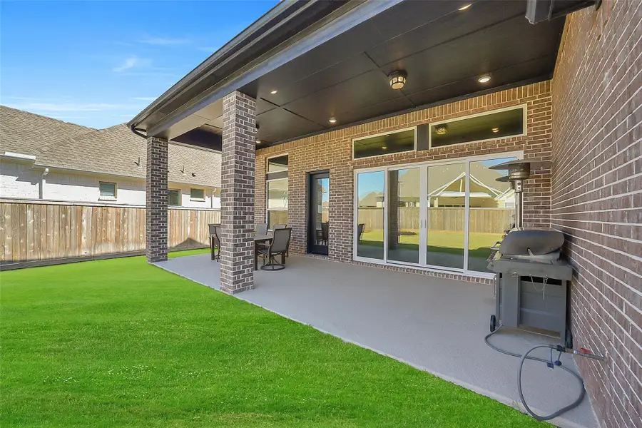 Exterior details and patio area of a home in , Cypress (Image 25).