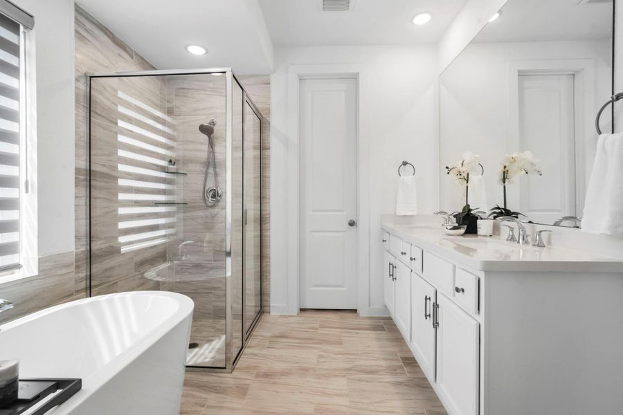 En-suite primary bathroom with closet straight ahead En-suite primary bathroom with closet straight ahead