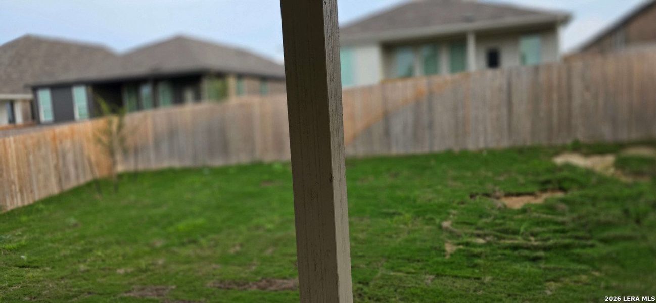 Exterior details and patio area of a home in Voss Farms, New Braunfels (Image 2).