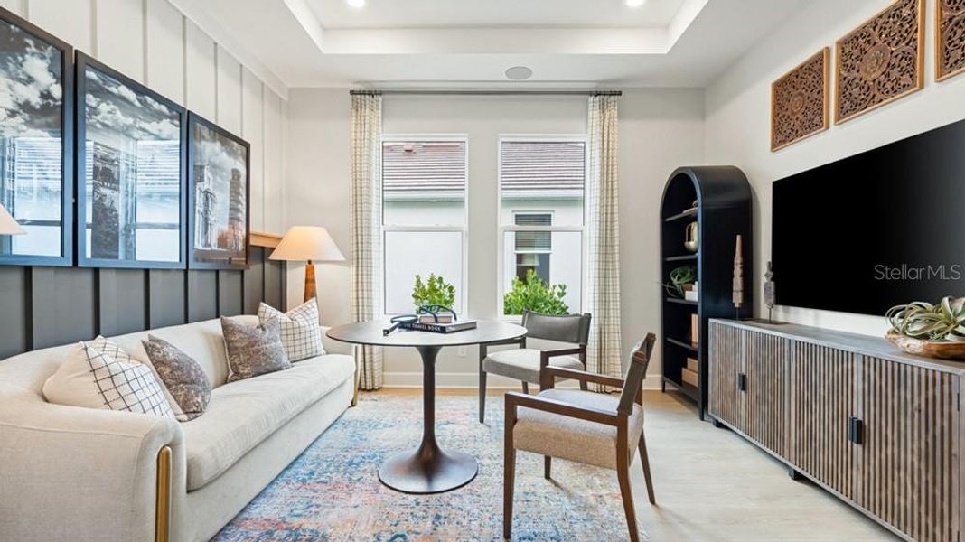 Furnished interior view inside a new home in Esplanade at Starling, Punta Gorda (Image 9).