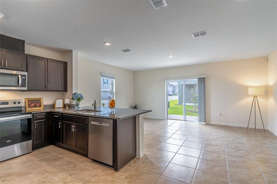 Furnished interior view inside a new home in , Davenport (Image 5).