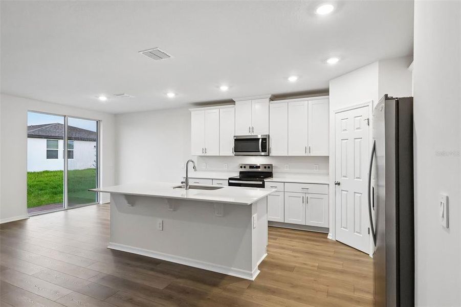 Furnished interior view inside a new home in Villamar - Signature Series, Winter Haven (Image 8). Furnished interior view inside a new home in Villamar - Signature Series, Winter Haven (Image 8).