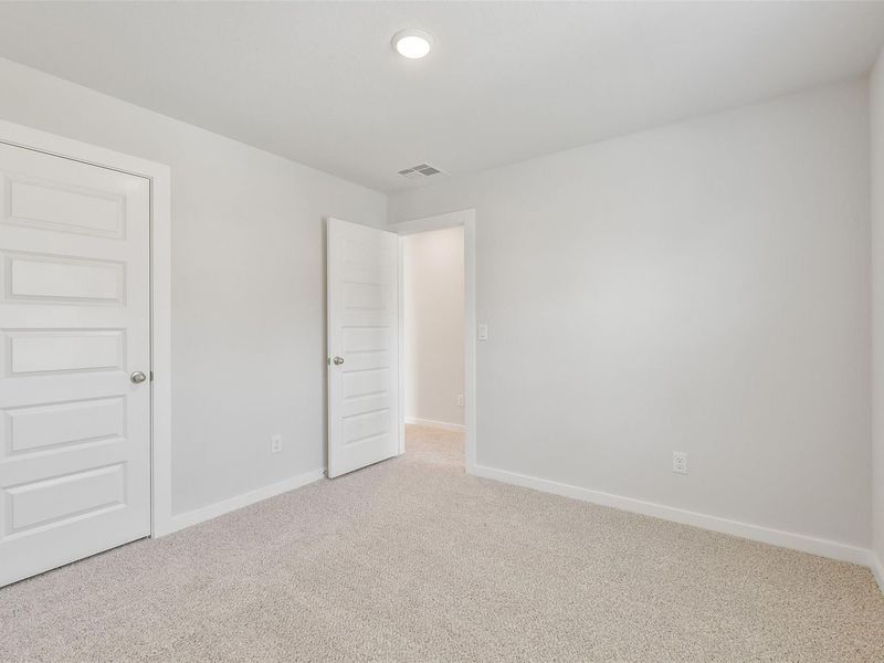 Spacious, unfurnished interior of a new home in Lakes at Black Oak, Magnolia (Image 32).