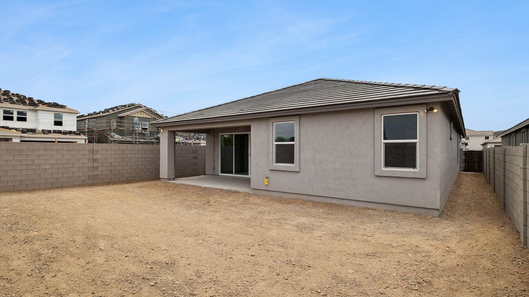 Exterior details and patio area of a home in The Ridge at Stone Butte, Phoenix (Image 3).