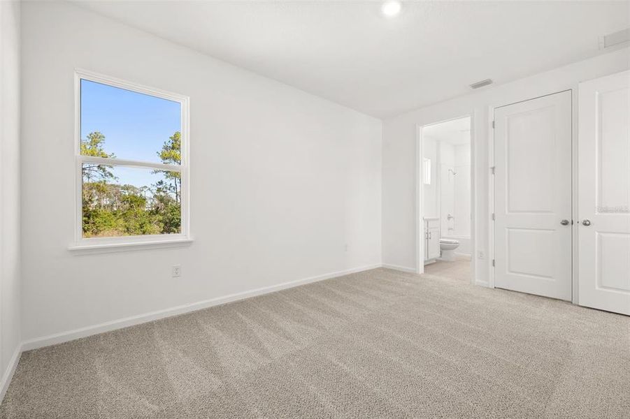 Spacious, unfurnished interior of a new home in Serenade at Ovation, Winter Garden (Image 31). Spacious, unfurnished interior of a new home in Serenade at Ovation, Winter Garden (Image 31).