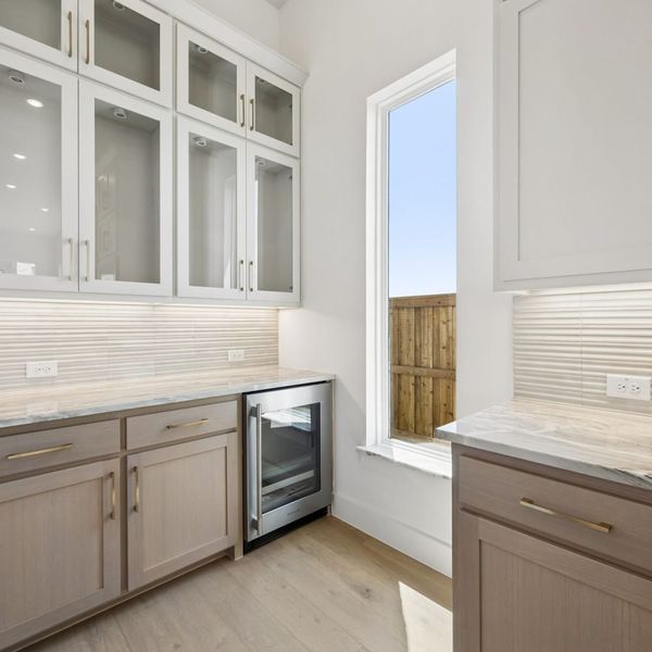 Furnished interior view inside a new home in StarView, Prosper (Image 18).