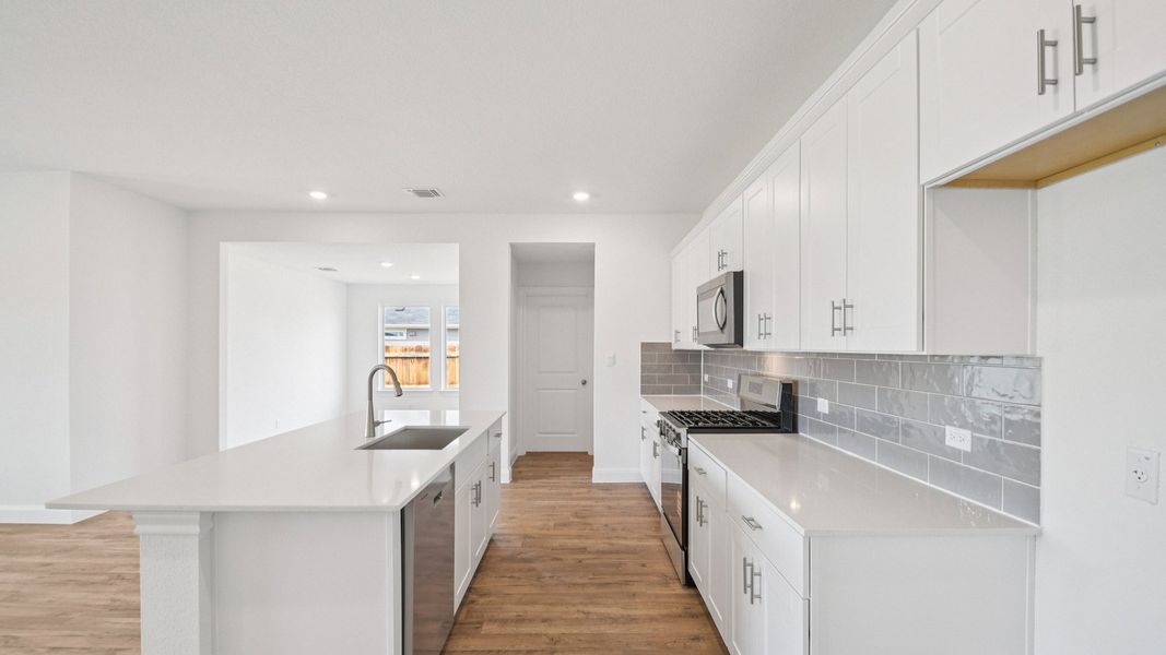 Furnished interior view inside a new home in Railhead, Cedar Creek (Image 7).