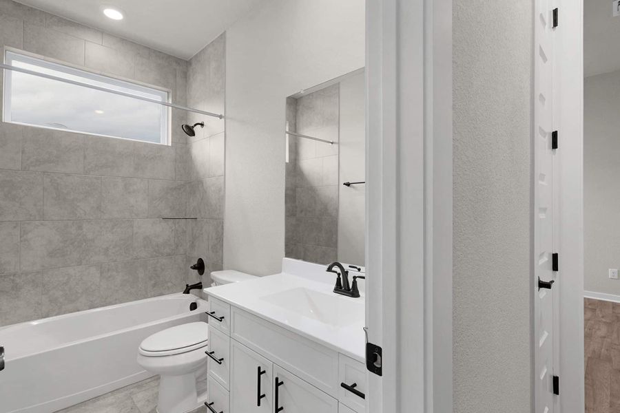 Furnished interior view inside a new home in Highland Village, Georgetown (Image 8).