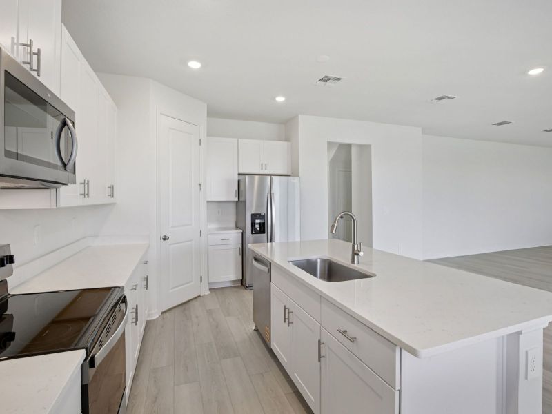 Furnished interior view inside a new home in Coasterra - Reserve Series, Palmetto (Image 4).
