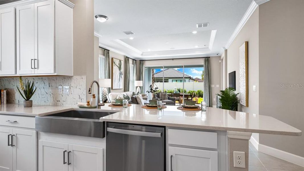 Furnished interior view inside a new home in Esplanade at Wiregrass Ranch, Wesley Chapel (Image 12).