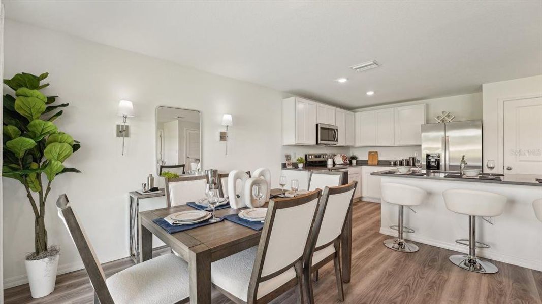 Furnished interior view inside a new home in Triumph South, Wildwood (Image 32).