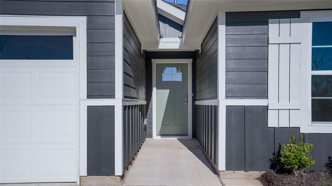 Front exterior of a new home in Marigold, Uhland, TX, highlighting curb appeal (Image 15). Front exterior of a new home in Marigold, Uhland, TX, highlighting curb appeal (Image 15).