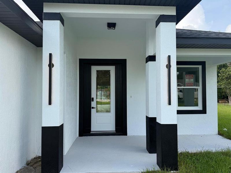 Exterior details and patio area of a home in , Summerfield (Image 33).