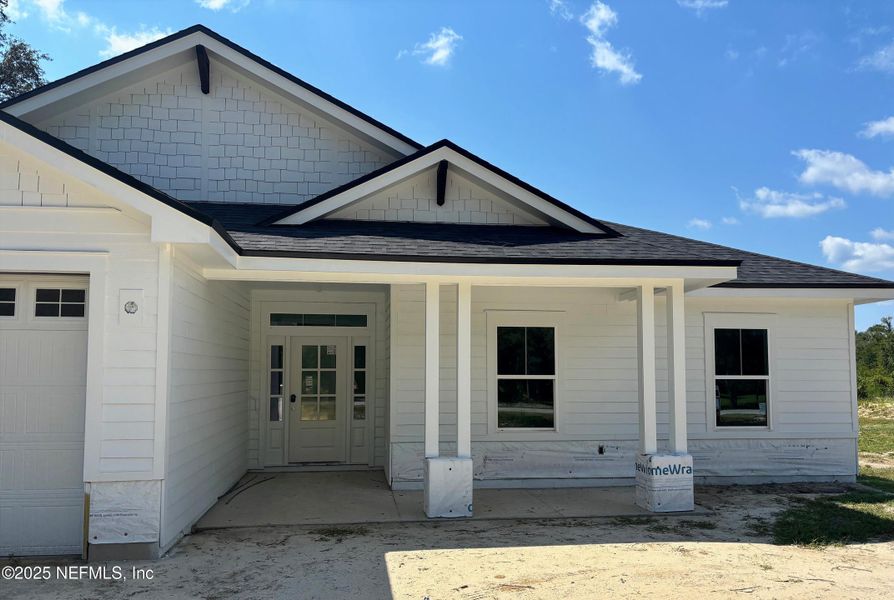 Front exterior of a new home in , Melrose, FL, highlighting curb appeal (Image 1). Front exterior of a new home in , Melrose, FL, highlighting curb appeal (Image 1).
