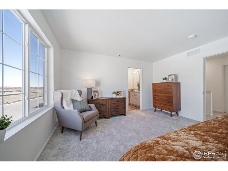Furnished interior view inside a new home in Thompson River Ranch, Johnstown (Image 10).