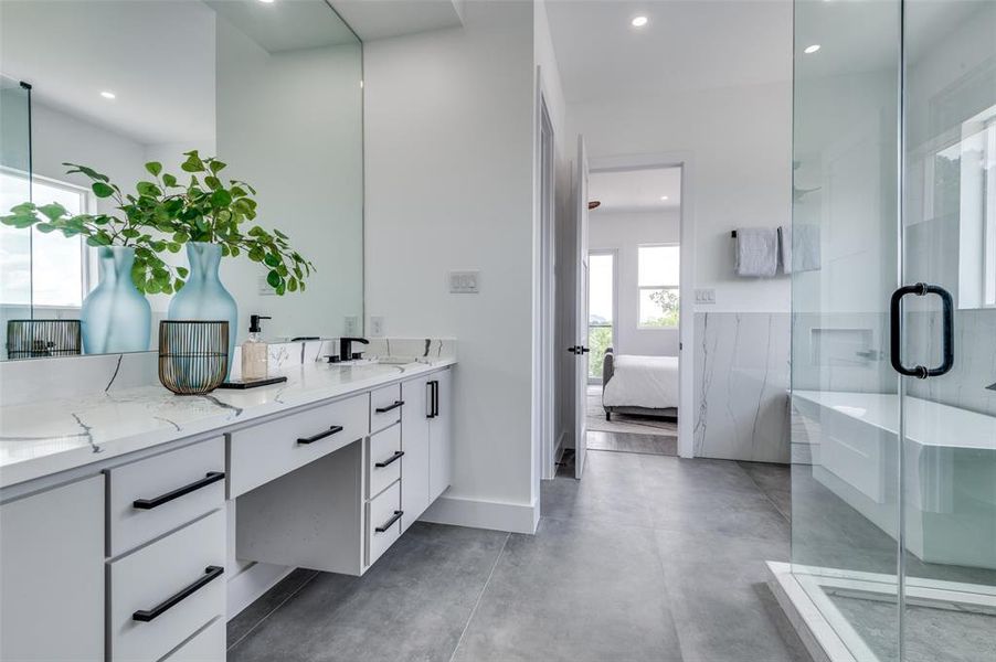 Bathroom with dual vanity and walk in shower