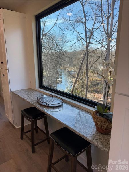 Breakfast space with a cove view and extra cabinets
