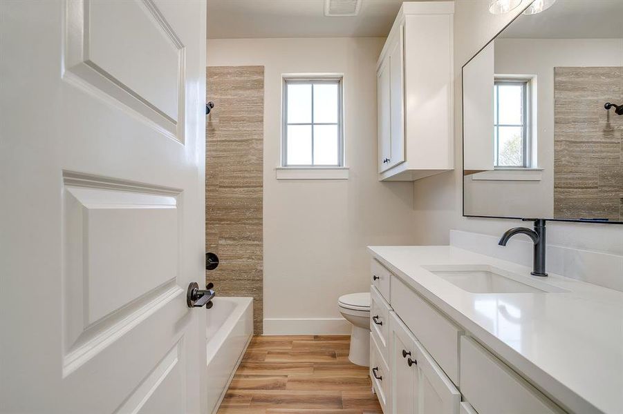 Furnished interior view inside a new home in , Poolville (Image 9).