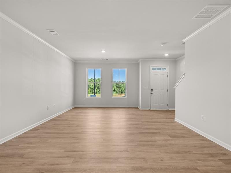 Spacious, unfurnished interior of a new home in Waypoint, Flowery Branch (Image 13).