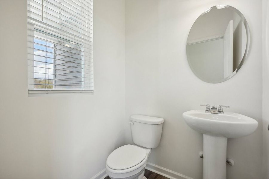 Furnished interior in a model home at Walker Station in Wilson (Image 7).