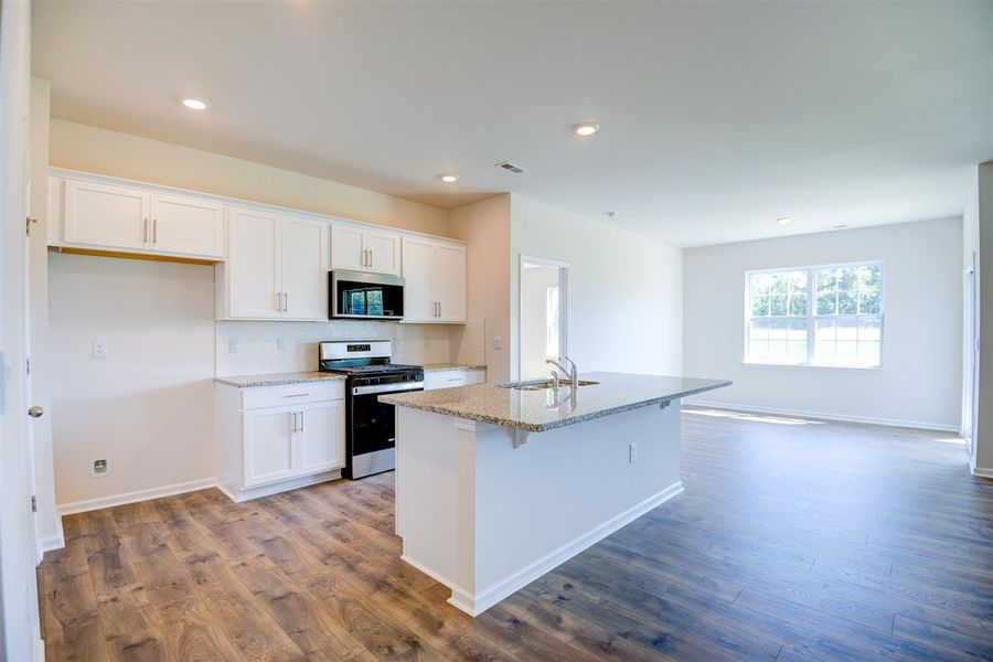 Representative furnished interior of a home built from the ARIA by D.R. Horton in West New Bern, New Bern (Image 4).