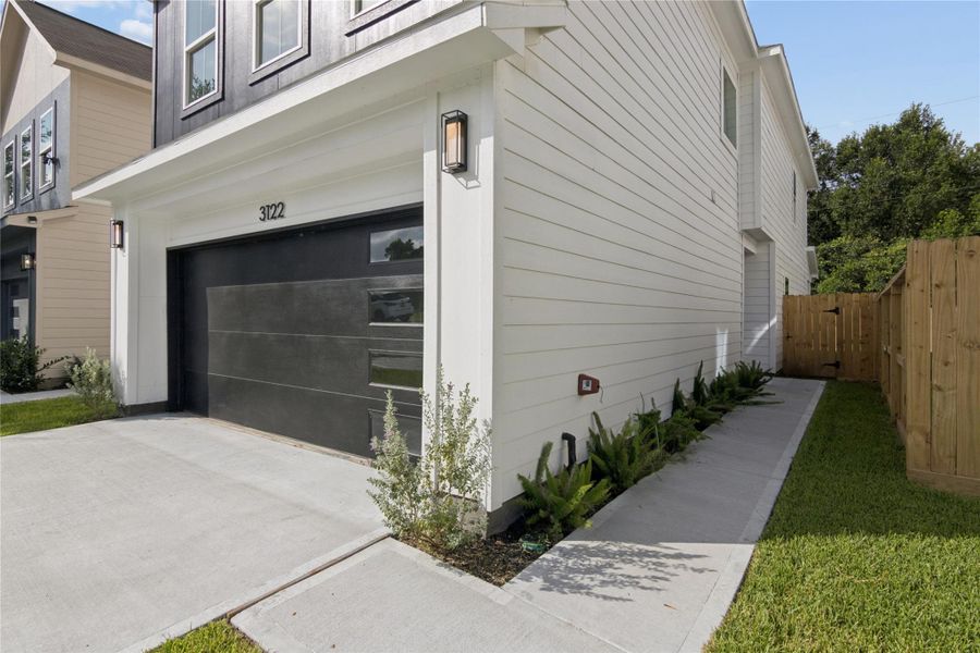 Exterior details and patio area of a home in , Houston (Image 3).