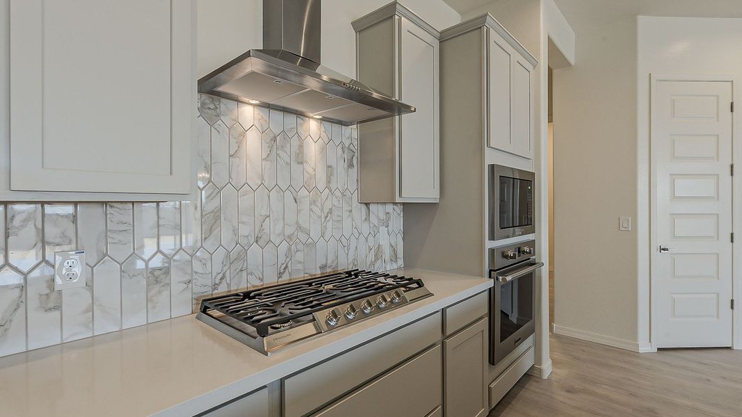 Furnished interior view inside a new home in Windrose, Waddell (Image 12).