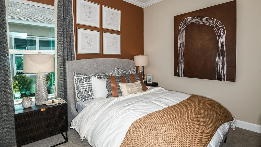 Representative furnished interior of a home built from the Lazio by Taylor Morrison in Esplanade at Westview, Kissimmee (Image 28).