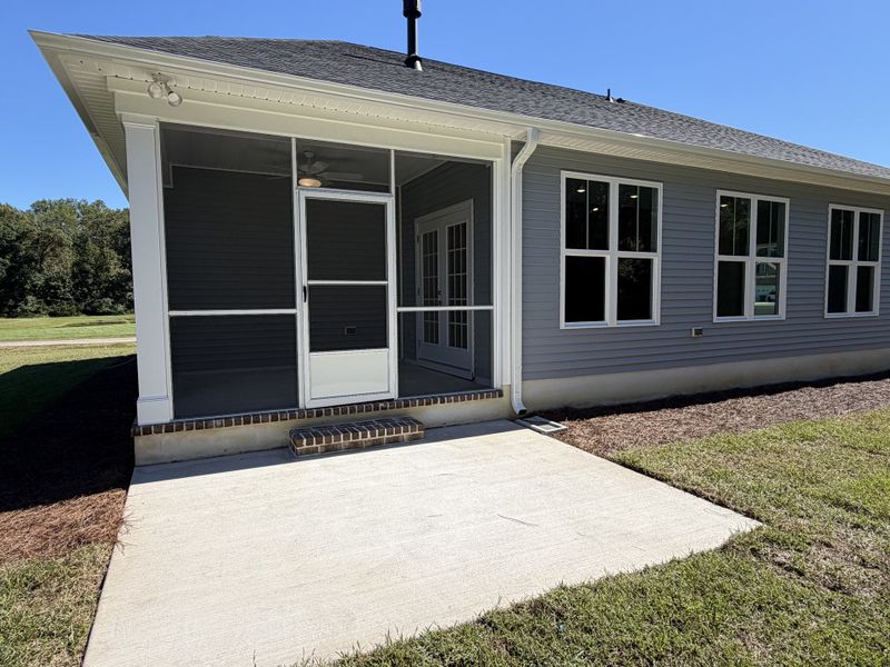 Exterior details and patio area of a home in Waterfall Estates, Whiteville (Image 25).