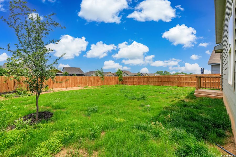 Exterior details and patio area of a home in Friendship Oaks, Fredericksburg (Image 4).
