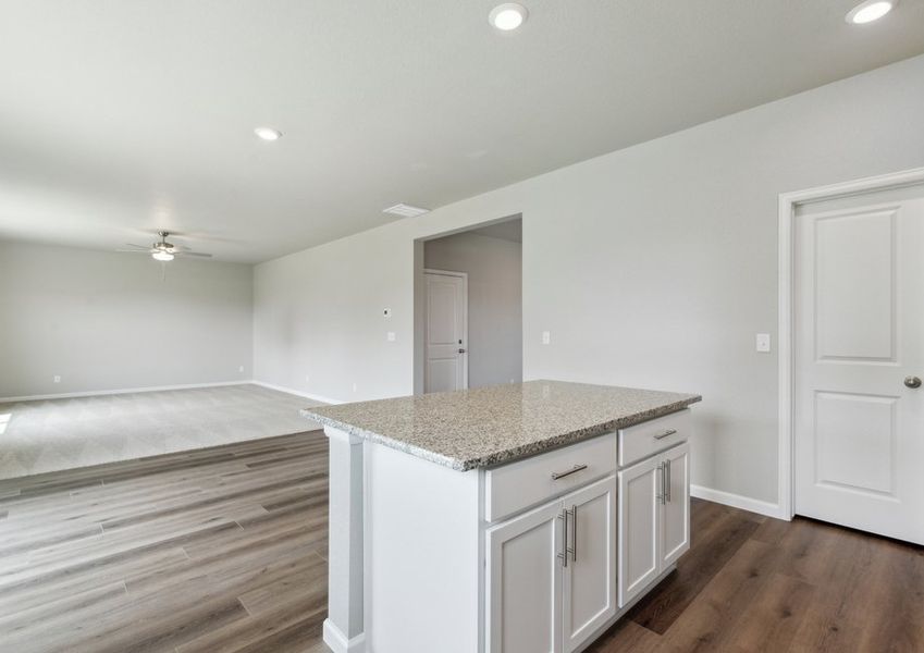 The family room is spacious and open to the dining room and kitchen.