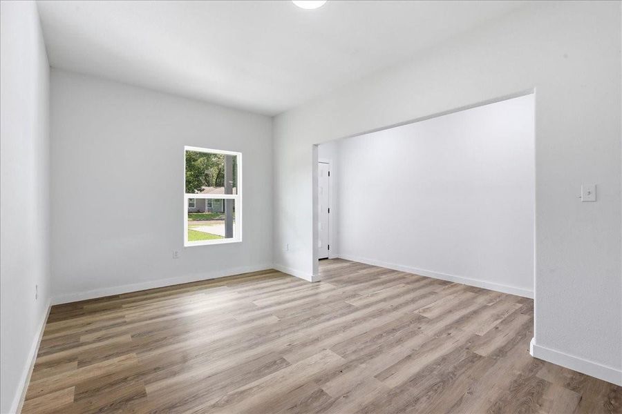 Seamless transition from the front entryway into the main living spaces of the home. Seamless transition from the front entryway into the main living spaces of the home.